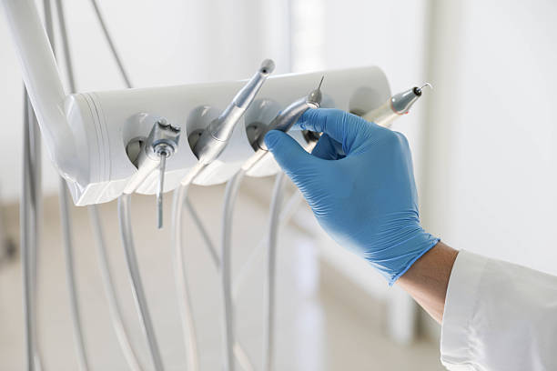 Professional Tooth Extraction technician working in Dobson, NC